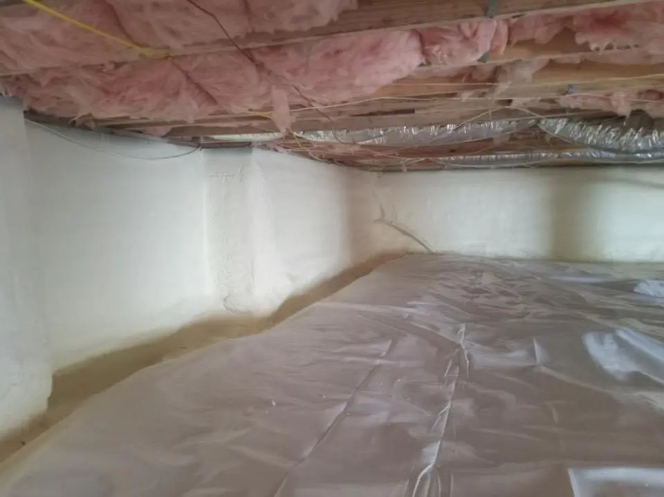 Crawl space encapsulation with closed-cell spray foam for Commercial Roof Restoration in Newberry